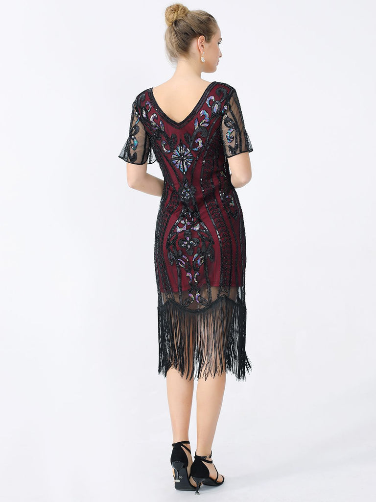 She slips into this 1920s Fringe Sequin Flapper Dress and suddenly it's a 1920s daydream