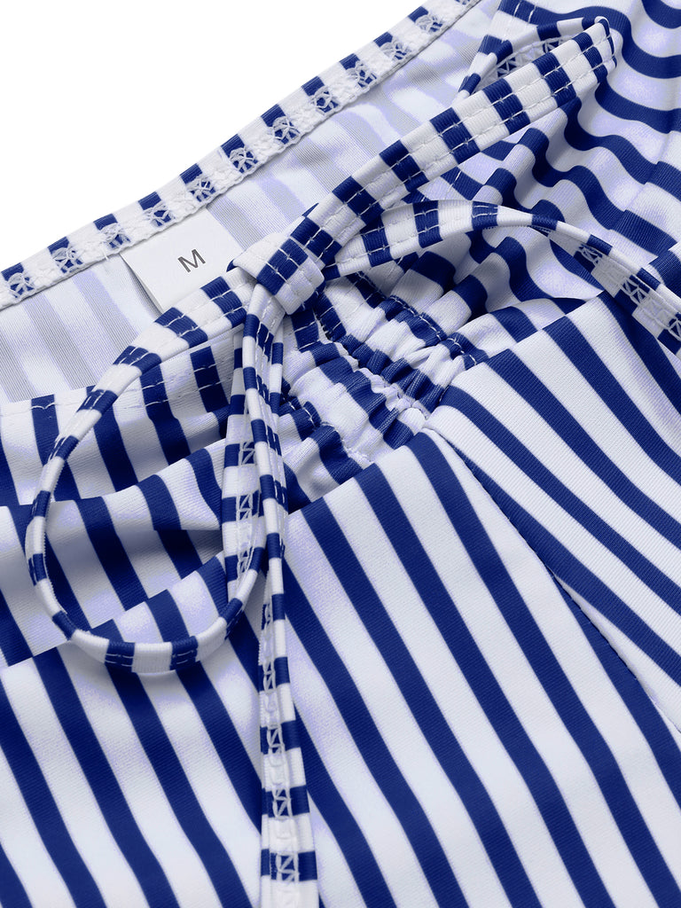 She's wearing 1930s Drawstring Straps Vertical Stripe Boxer Bikini and the whole beach remembers the 1930s