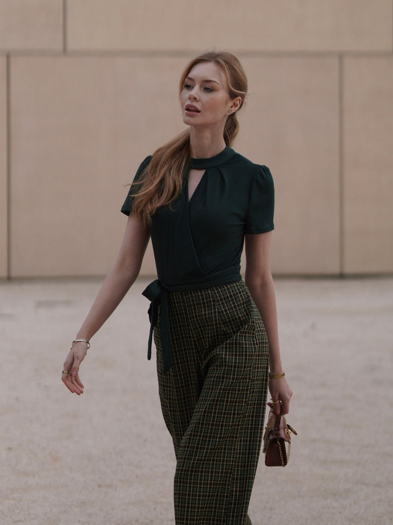 She adds this 1930s Plaid Keyhole Neck Belted Jumpsuit and suddenly it's 1930s perfection