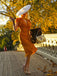 This 1930s Ruffle Lace-up Fishtail Dress wraps her in 1930s elegance, one twirl at a time