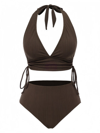 She's wearing 1930s Textured Fabric Solid Halter Lace-Up Swimsuit and the whole beach remembers the 1930s