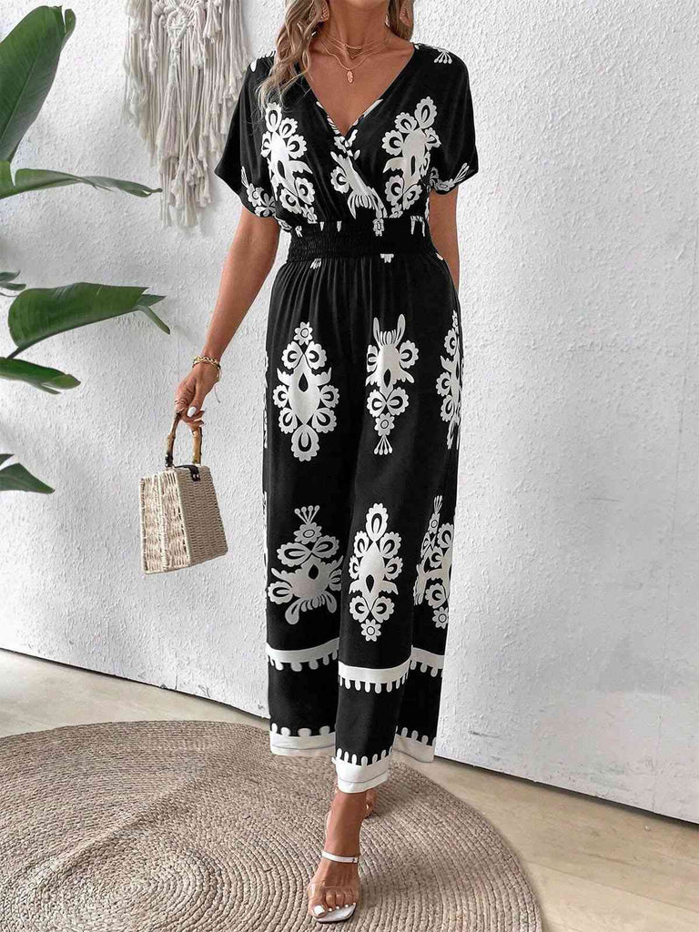 This 1930s V-Neck National Totem Wideleg Jumpsuit whispers 1930s secrets to those who notice