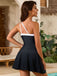 This 1940s One-Shoulder Colorblock Ties Swimdress wraps her in 1940s elegance, one twirl at a time