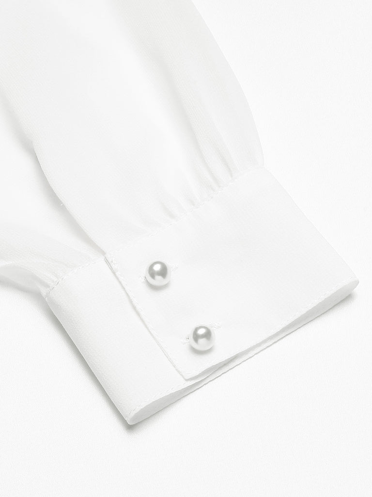 She pairs this 1940s Round Neck Satin Puff Sleeve Blouse with confidence and 1940s charm