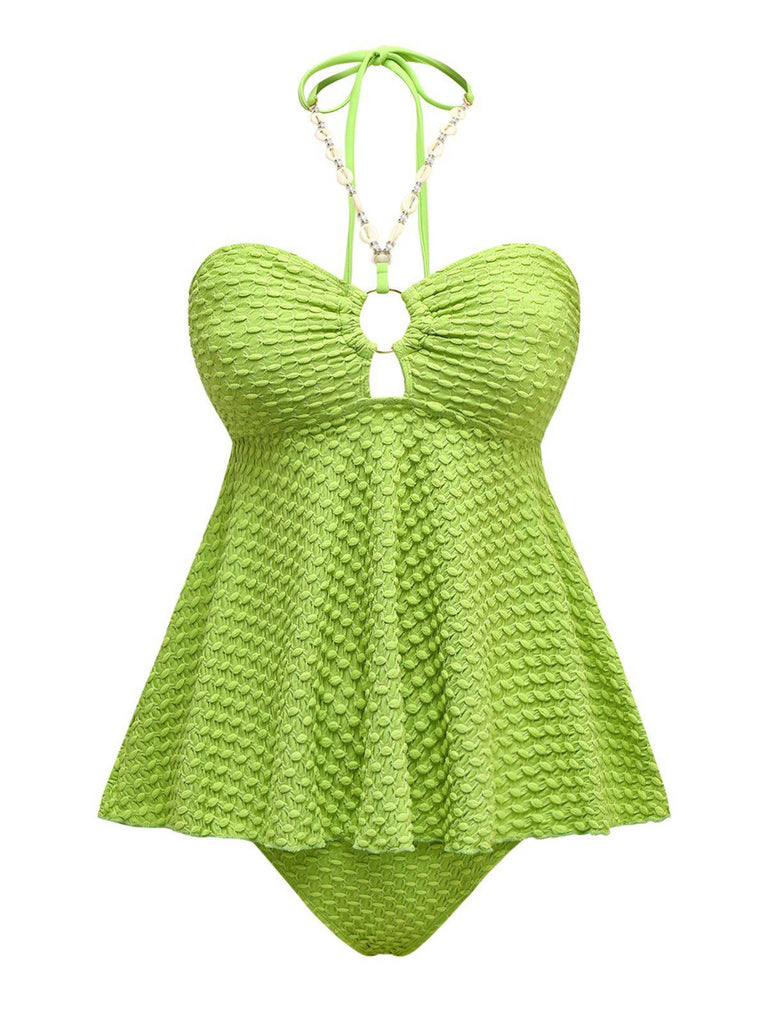 She's wearing 1940s Seashell Chain Lace-Up Halter Swimsuit and the whole beach remembers the 1940s