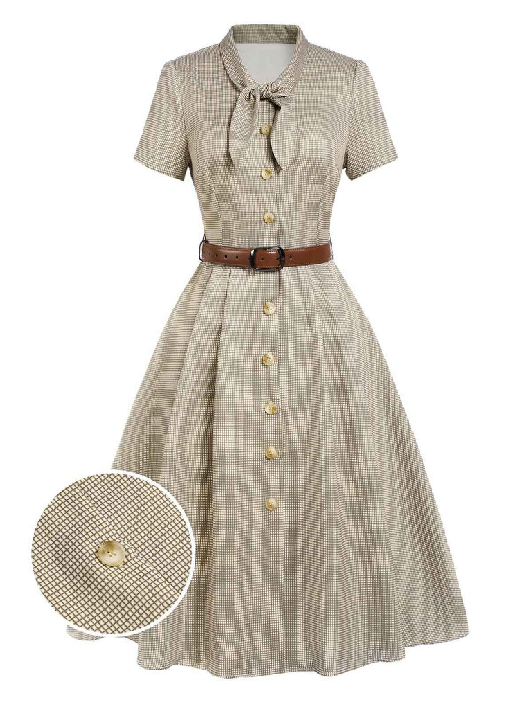 She slips into this 1940s Small Windowpane Plaid Dress and suddenly it's a 1940s daydream