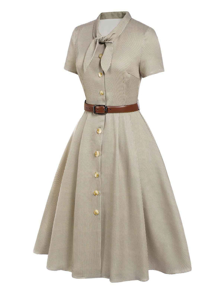 This 1940s Small Windowpane Plaid Dress wraps her in 1940s elegance, one twirl at a time