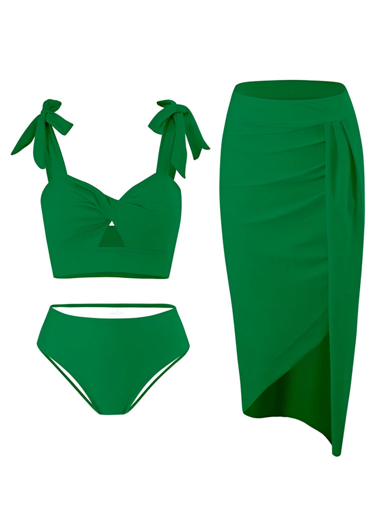She's wearing 1940s Solid Shoulder Tie Hollow Swimsuit & Cove-Up and the whole beach remembers the 1940s