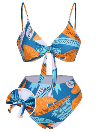 She's wearing 1940s Spaghetti Strap Print Swimsuit & Cover-Up and the whole beach remembers the 1940s