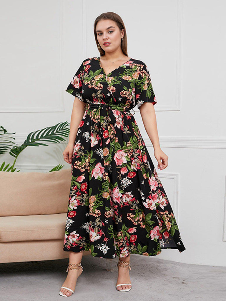 She slips into this 1940s Surplice V-Neck Belted Floral Dress and suddenly it's a 1940s daydream