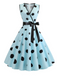 1950s Bow Polka Dot Swing Dress — vintage elegance for the modern woman