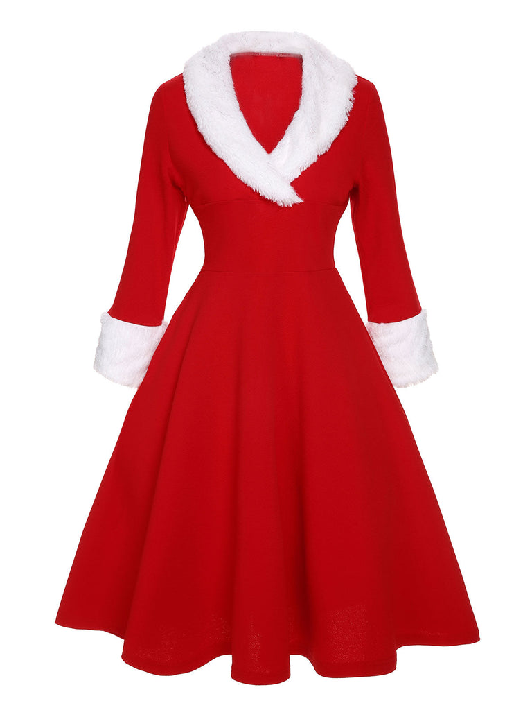 This 1950s Christmas Lapel Dress wraps her in 1950s elegance, one twirl at a time
