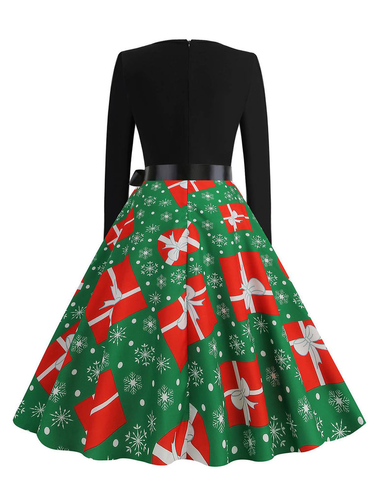 She slips into this 1950s Christmas Patchwork Long Sleeve Dress and suddenly it's a 1950s daydream