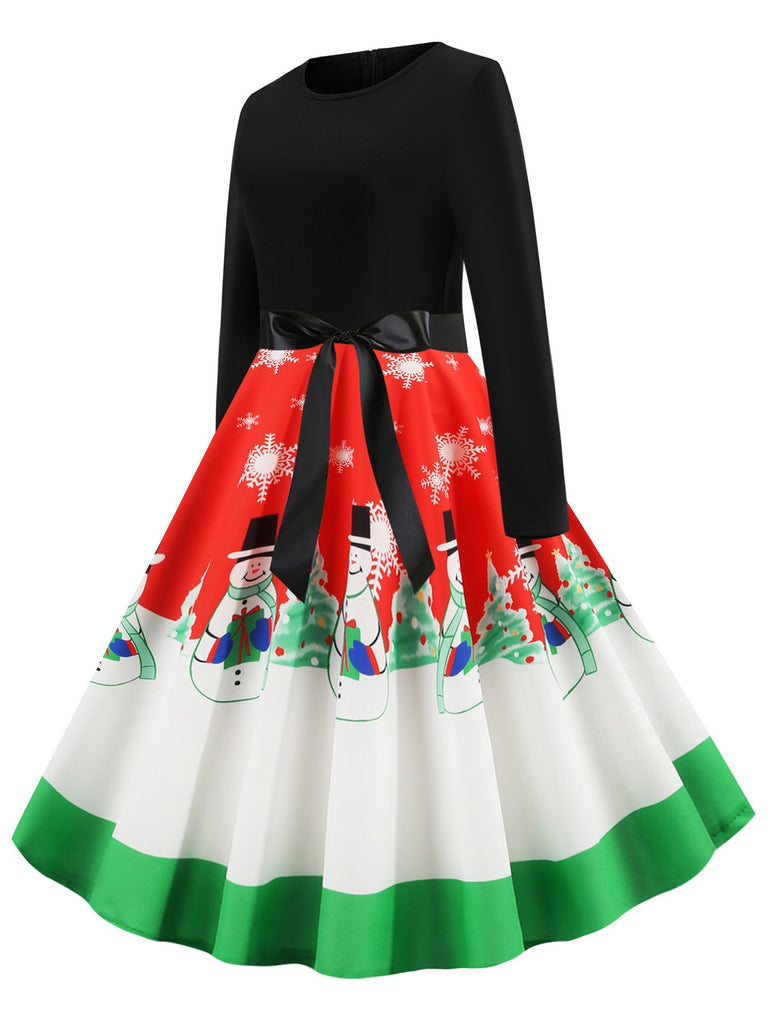 She slips into this 1950s Christmas Patchwork Swing Dress and suddenly it's a 1950s daydream