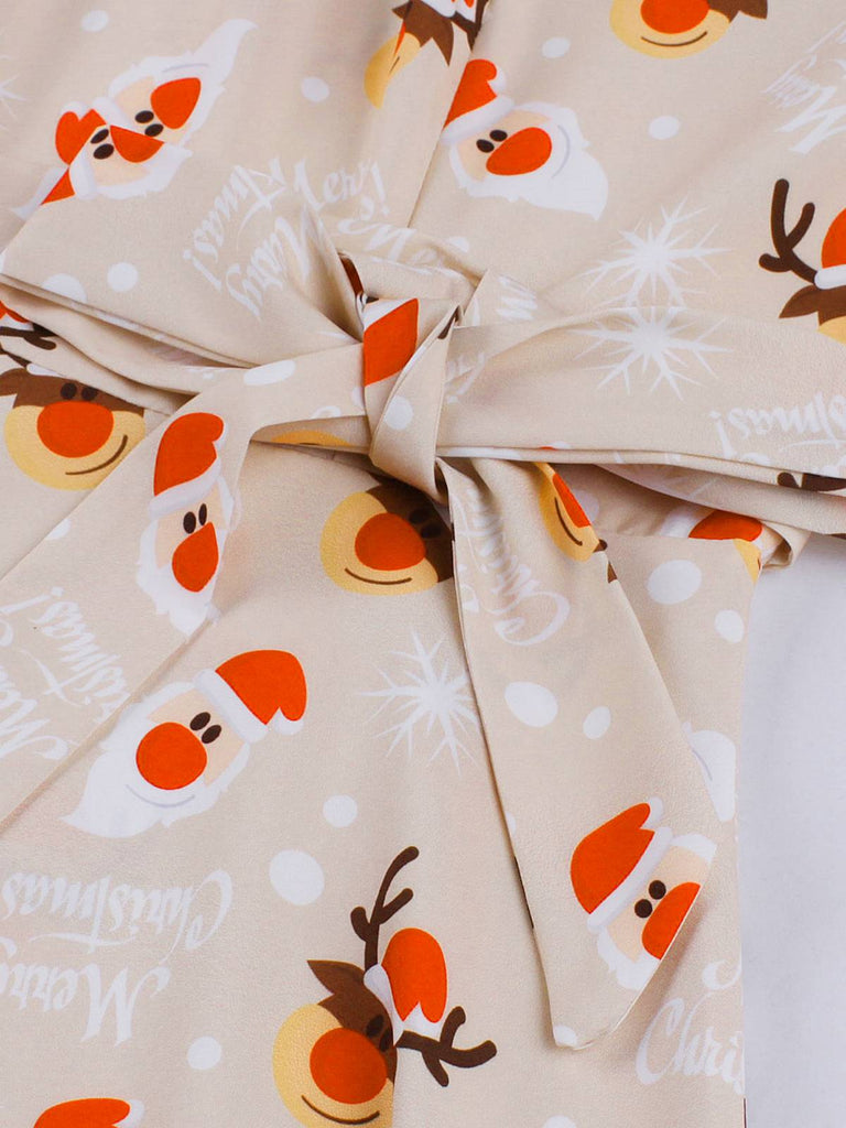 1950s Christmas Santa & Elk Print Swing Dress — the kind of 1950s dress that makes strangers smile