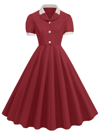 She slips into this 1950s Contrast Short Sleeve Lapel Dress and suddenly it's a 1950s daydream