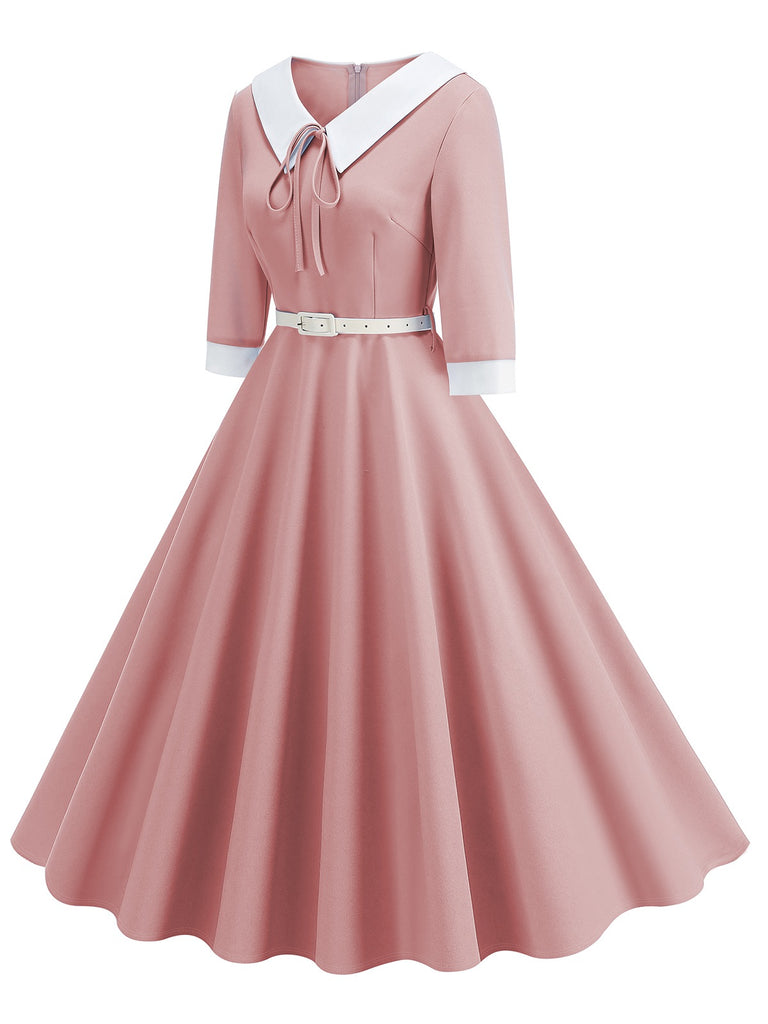 This 1950s Contrast Tie Neck Belted Lapel Dress wraps her in 1950s elegance, one twirl at a time