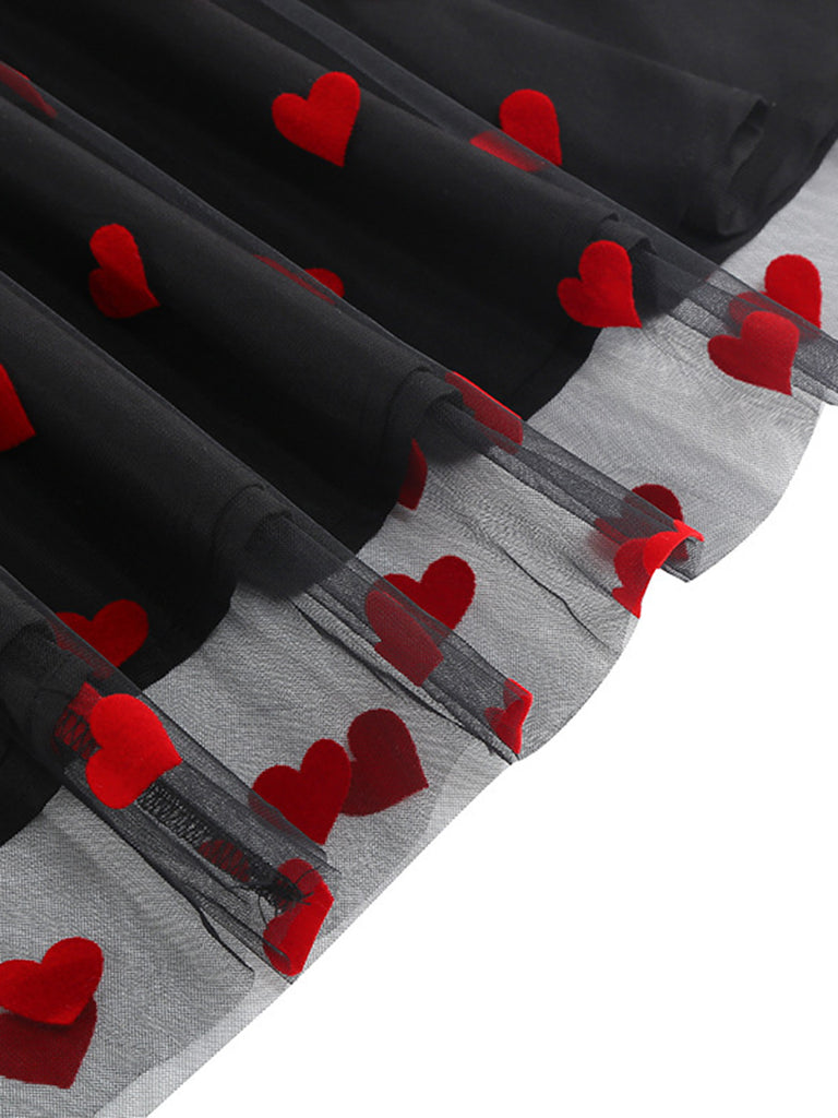 This 1950s Flocked Heart Mesh Patchwork Dress wraps her in 1950s elegance, one twirl at a time