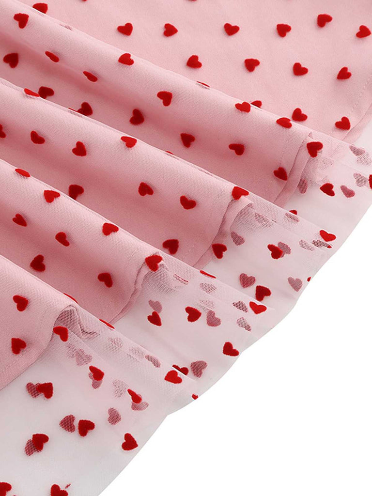 This 1950s Flocked Heart Mesh Patchwork Dress wraps her in 1950s elegance, one twirl at a time