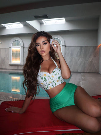 Model 3: Green 1950s Floral Halter Lace-up Bikini Set, vintage swimwear with yellow floral print top and ruched high-waisted bottom
