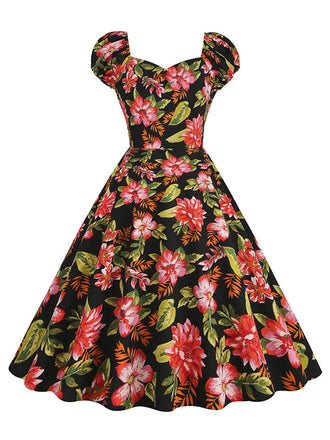 She slips into this 1950s Floral Hepburn Elegant Vintage Dress and suddenly it's a 1950s daydream