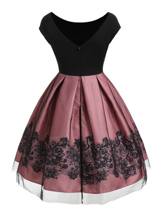 She wears 1950s Floral Print Off Shoulder Dress with 1950s grace