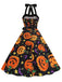 She slips into this 1950s Halloween Pumpkin Face Halter Dress and suddenly it's a 1950s daydream