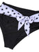 She's wearing 1950s Halter Contrast Polka Dots Swimsuit and the whole beach remembers the 1950s
