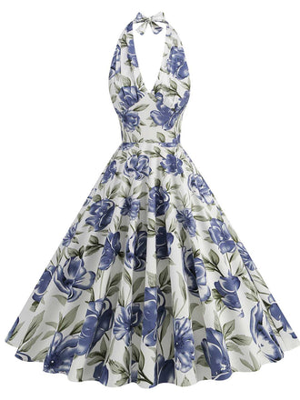 She slips into this 1950s Halter Floral Sleeveless Dress and suddenly it's a 1950s daydream