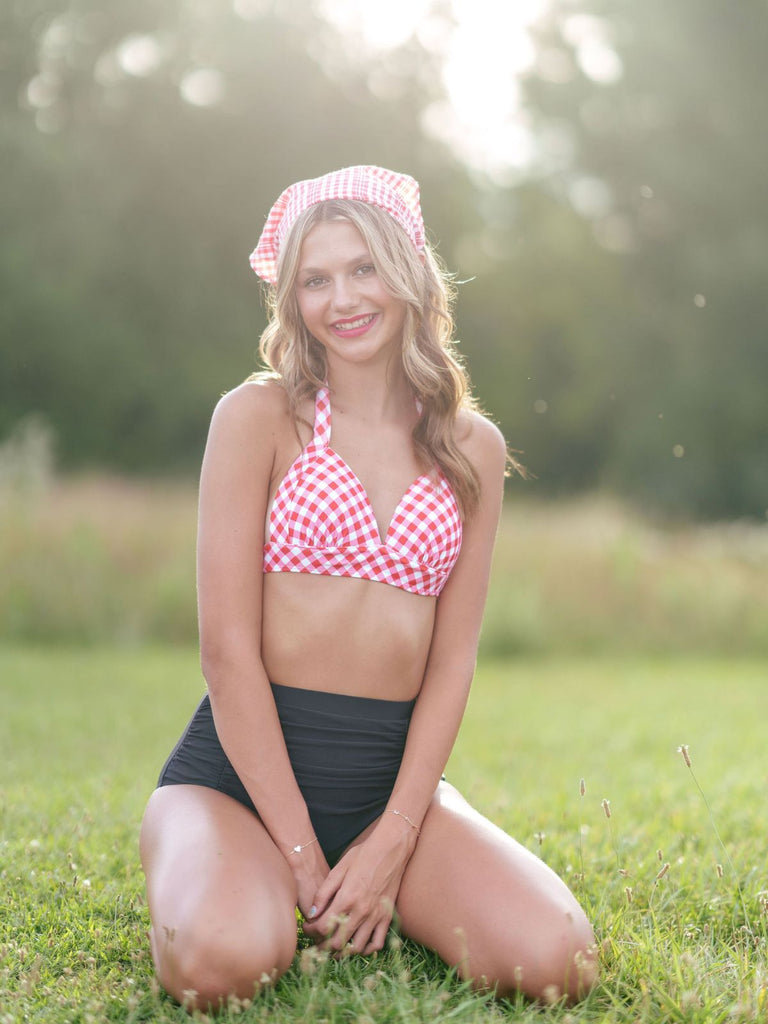 She's wearing 1950s Halter Plaids Lace-Up Swimsuit and the whole beach remembers the 1950s