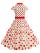 1950s Lapel Polka Dots Bow Swing Dress — the kind of 1950s dress that makes strangers smile