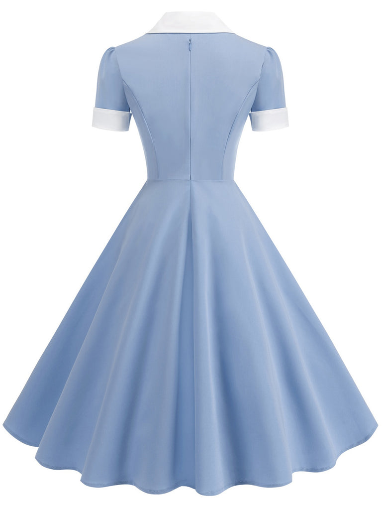 This 1950s Notched Collar Colorblock Swing Dress wraps her in 1950s elegance, one twirl at a time