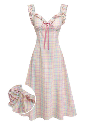 Pastel plaid swing dress with ruffled bow details and sweetheart neckline for 1950s vintage styling
