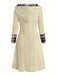 This 1950s Plaid Knit Hooded Dress wraps her in 1950s elegance, one twirl at a time