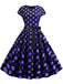 She slips into this 1950s Polka Dot Cap Sleeved Dress and suddenly it's a 1950s daydream