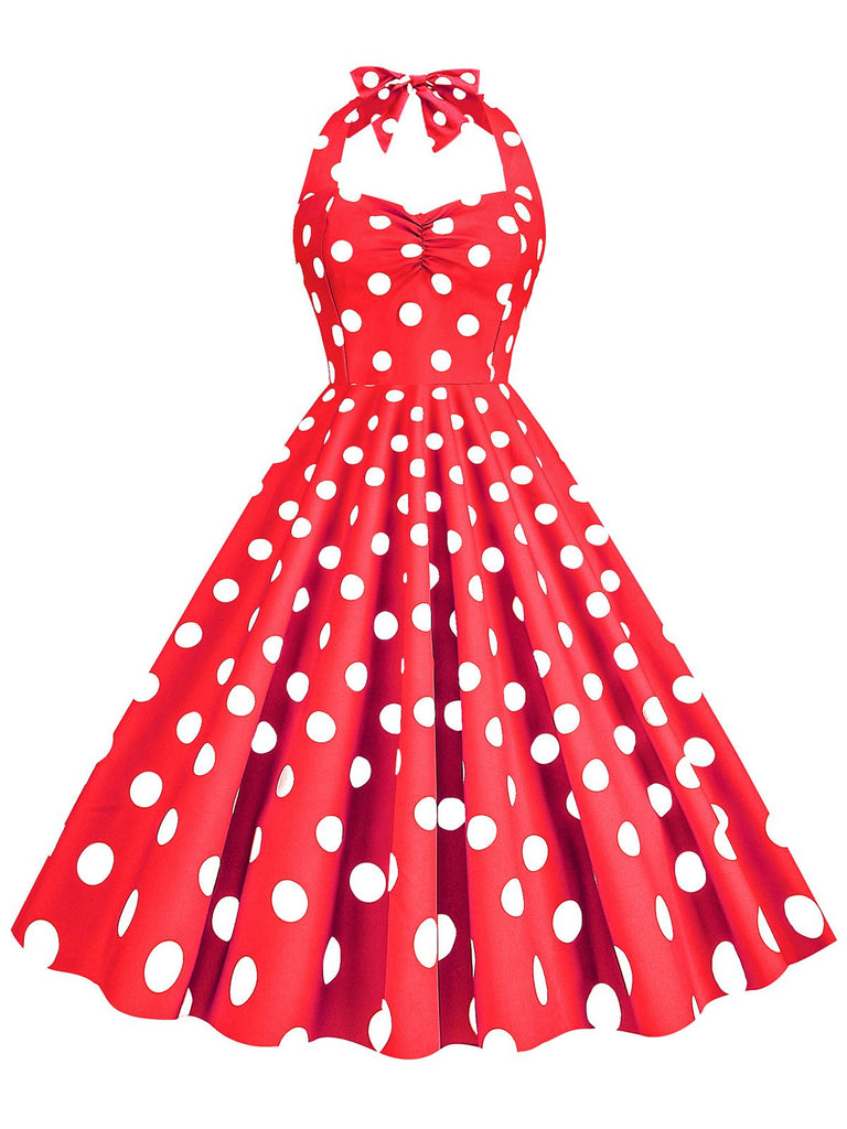 She slips into this 1950s Polka Dot Halter Swing Dress and suddenly it's a 1950s daydream