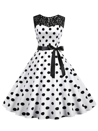 She slips into this 1950s Polka Dot Lace Patchwork Dress and suddenly it's a 1950s daydream