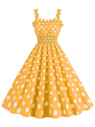 She slips into this 1950s Polka Dot Smocking Strap Dress and suddenly it's a 1950s daydream