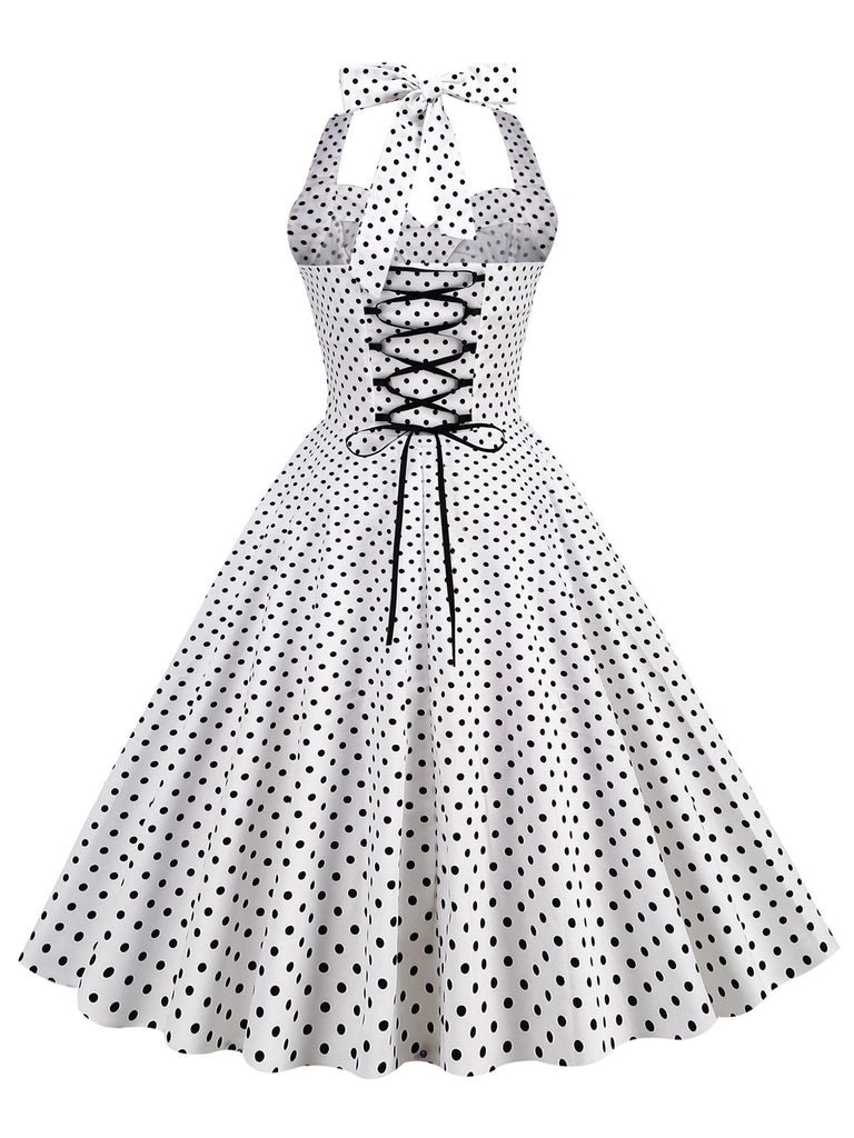 This 1950s Polka Dots Lace Up Halter Swing Dress wraps her in 1950s elegance, one twirl at a time