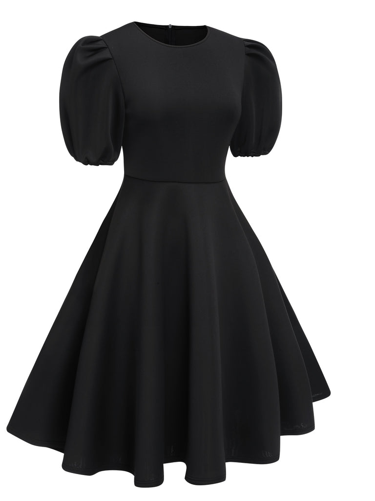 She slips into this 1950s Round Neck Puff Sleeve A-Line Dress and suddenly it's a 1950s daydream
