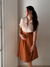 She slips into this 1950s Snow Style Button Dress and suddenly it's a 1950s daydream