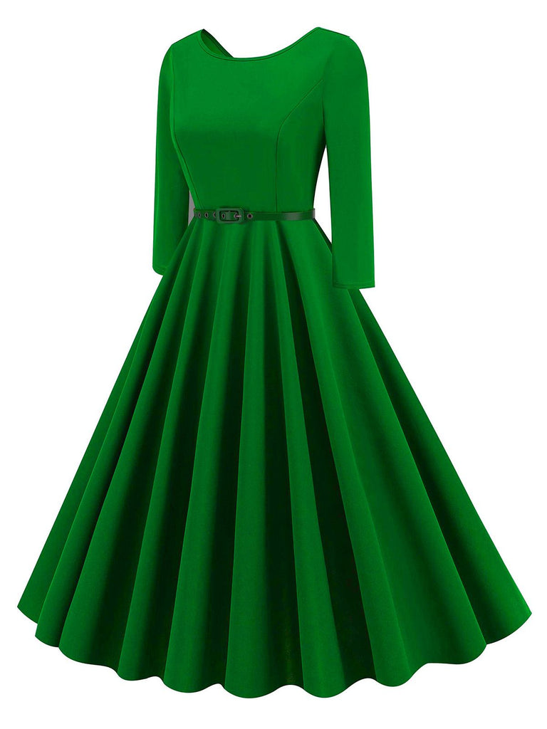 She slips into this 1950s Solid Belted Swing Dress and suddenly it's a 1950s daydream