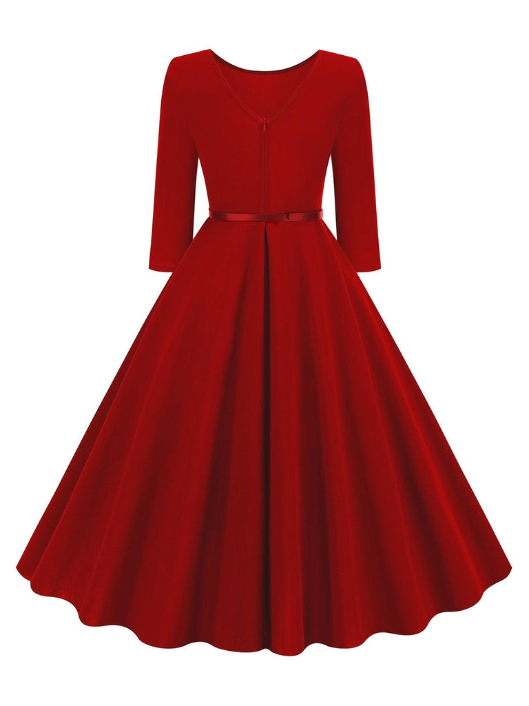 This 1950s Solid Belted Swing Dress wraps her in 1950s elegance, one twirl at a time