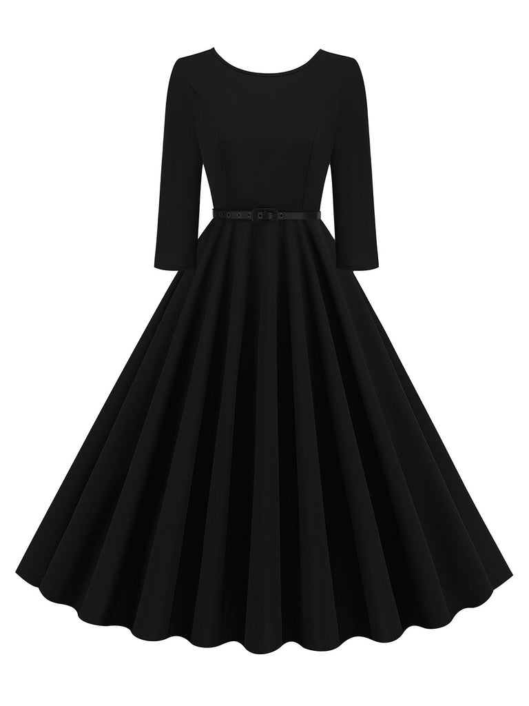 1950s Solid Belted Swing Dress — a 1950s silhouette that turns sidewalks into runways