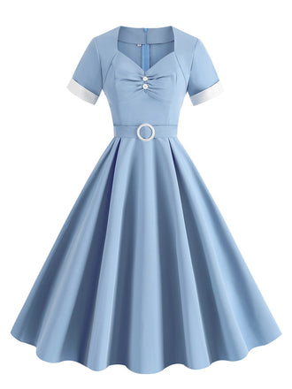 She slips into this 1950s Solid Contrast V-Neck Swing Dress and suddenly it's a 1950s daydream