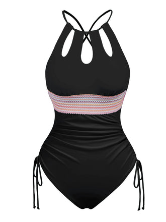 She's wearing 1950s Solid Keyhole Collar Cross-Bind Swimsuit and the whole beach remembers the 1950s