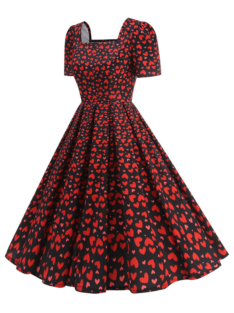 This 1950s Square Neck Heart Dots Dress wraps her in 1950s elegance, one twirl at a time
