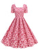 This 1950s Square Neck Heart Dots Dress wraps her in 1950s elegance, one twirl at a time