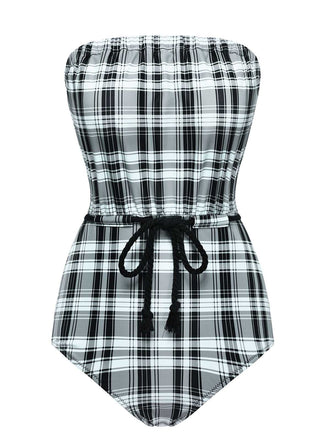She's wearing 1950s Strapless Plaids One-Piece Swimsuit and the whole beach remembers the 1950s