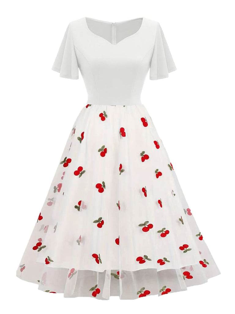 She slips into this 1950s Sweetheart Neck Cherry Mesh Dress and suddenly it's a 1950s daydream